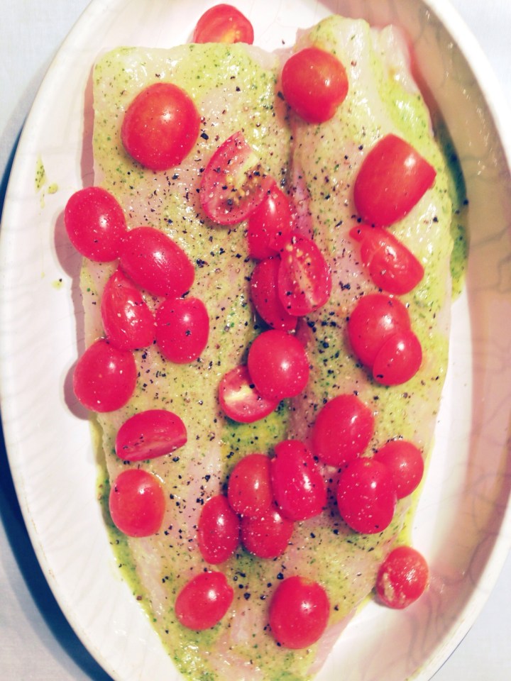 Baked bass with pesto and cherry&nbsp;tomatoes